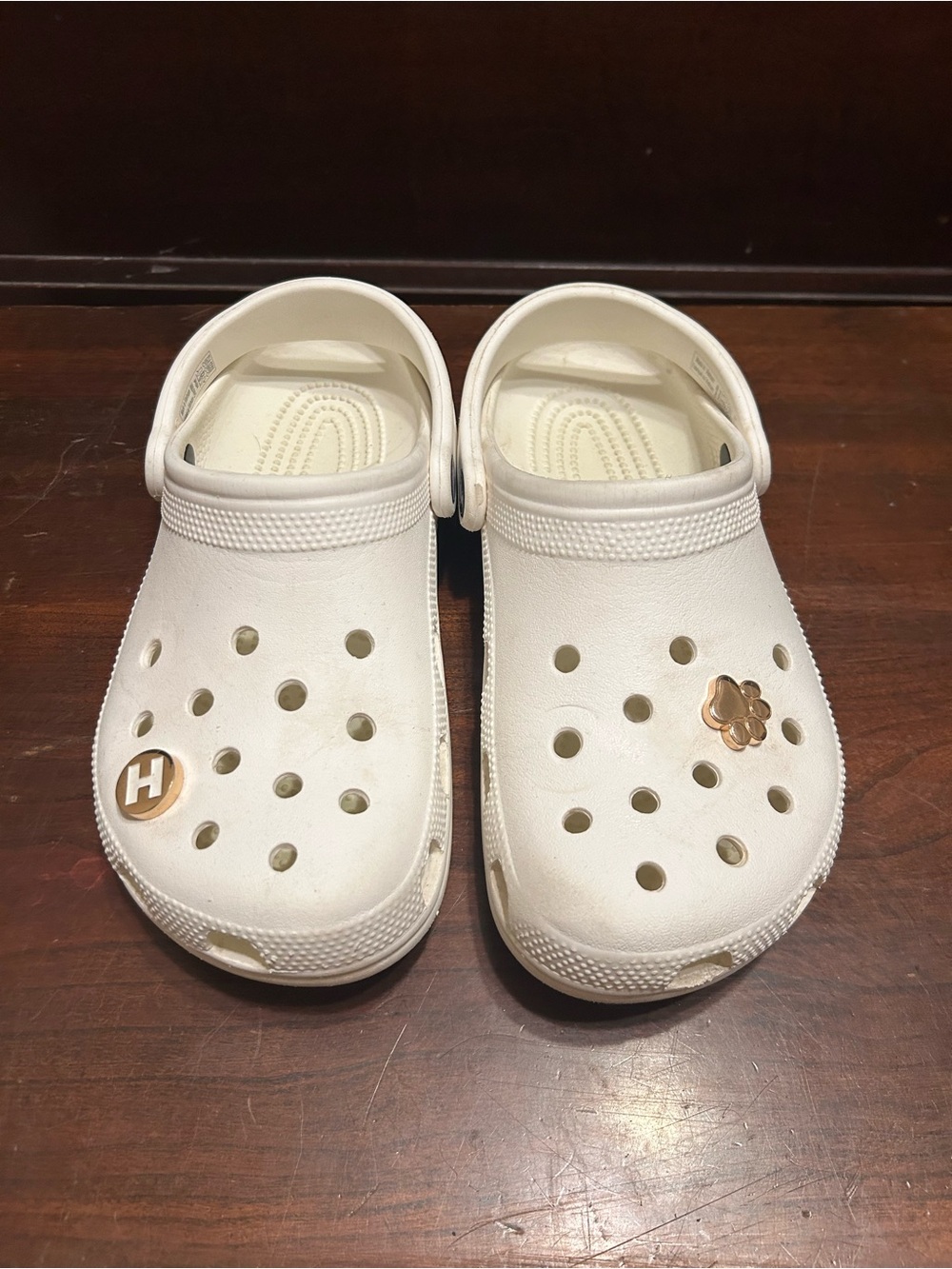 CROCS White Slip-On Clogs with Gold Charm Accents